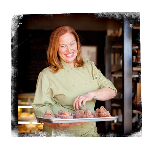 Chef Charleen Badman holds a tray of pasties.